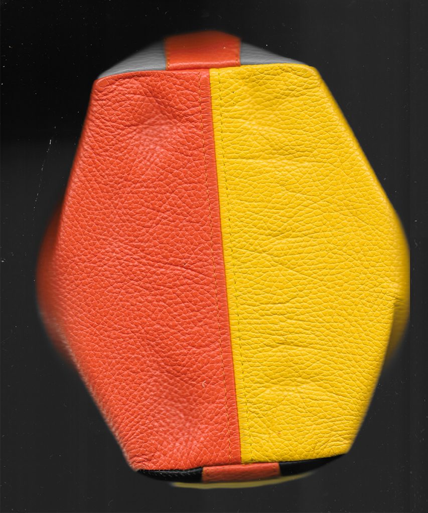 Product image of Safewear bag made from orange, gray and yellow cowhide